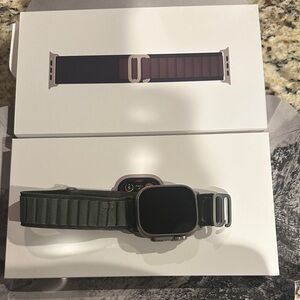 Preowned Apple Watch ultra first generation 49mm with Green Band